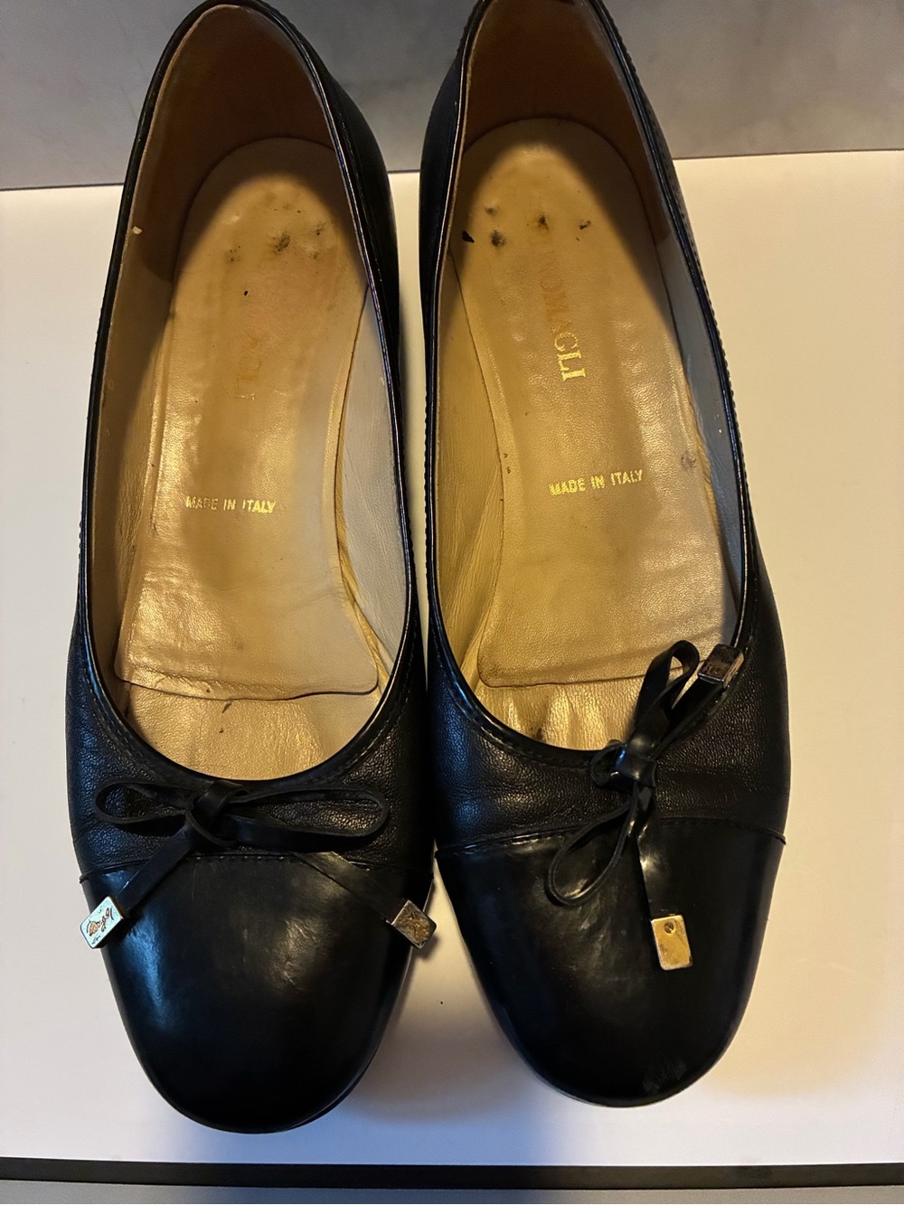 Bruno Magli Black Leather Ballet Flats with Bow and Gold Accents